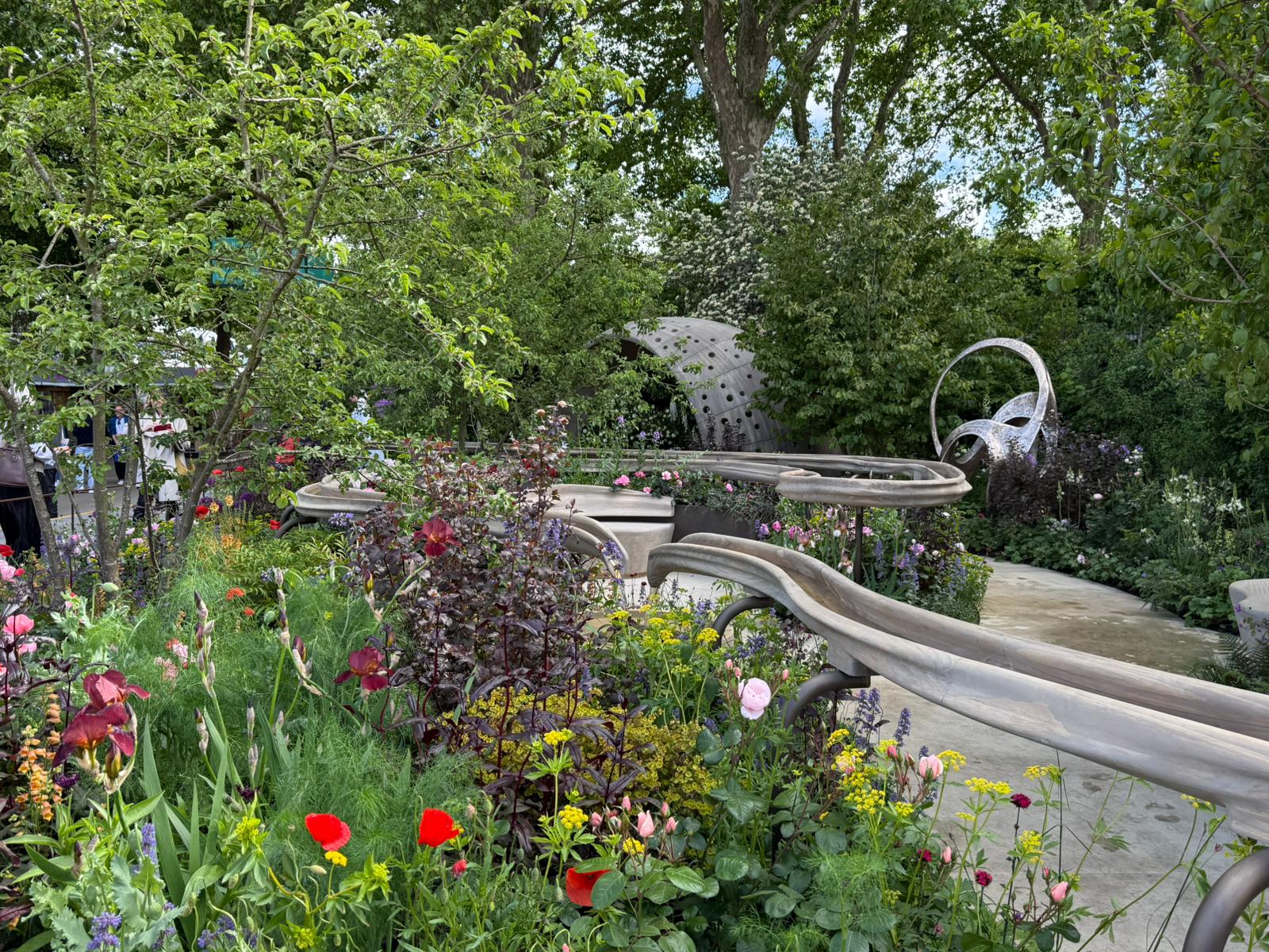 Images of the Parkinson's garden, richly planted and sensory, to reflect some of the symptoms of the disease
