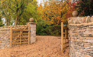 Timber gates to rural driveway