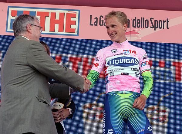 Enrico Gasparotto receives congratulations from UCI President Pat McQuaid.