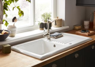 wooden kitchen worktop with white inset sink