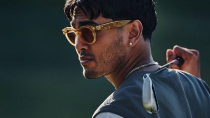 Oakley Meta HSTN smart glasses worn by golfer
