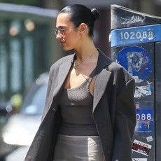 Callum Turner and Dua Lipa were seen enjoying a date in New York City on May 3, 2025. The pair drew attention with their chemistry and casual outing through the bustling streets of Manhattan. Dua was holding a chic Alaïa - Le Teckel Small Bag in Goatskin and wore a revealing sheer skirt.