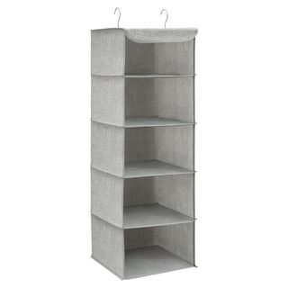 A cutout of a grey hanging wardrobe organiser on a white background