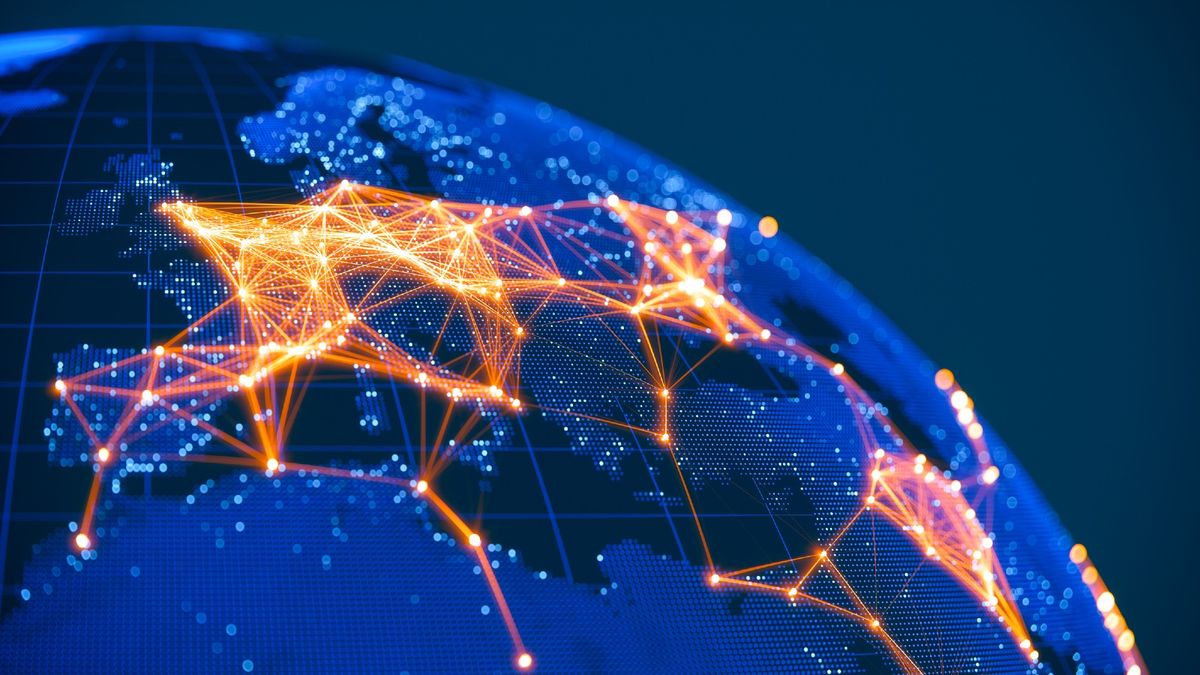 A virtual concept of the internet linking together places on the globe with orange lines