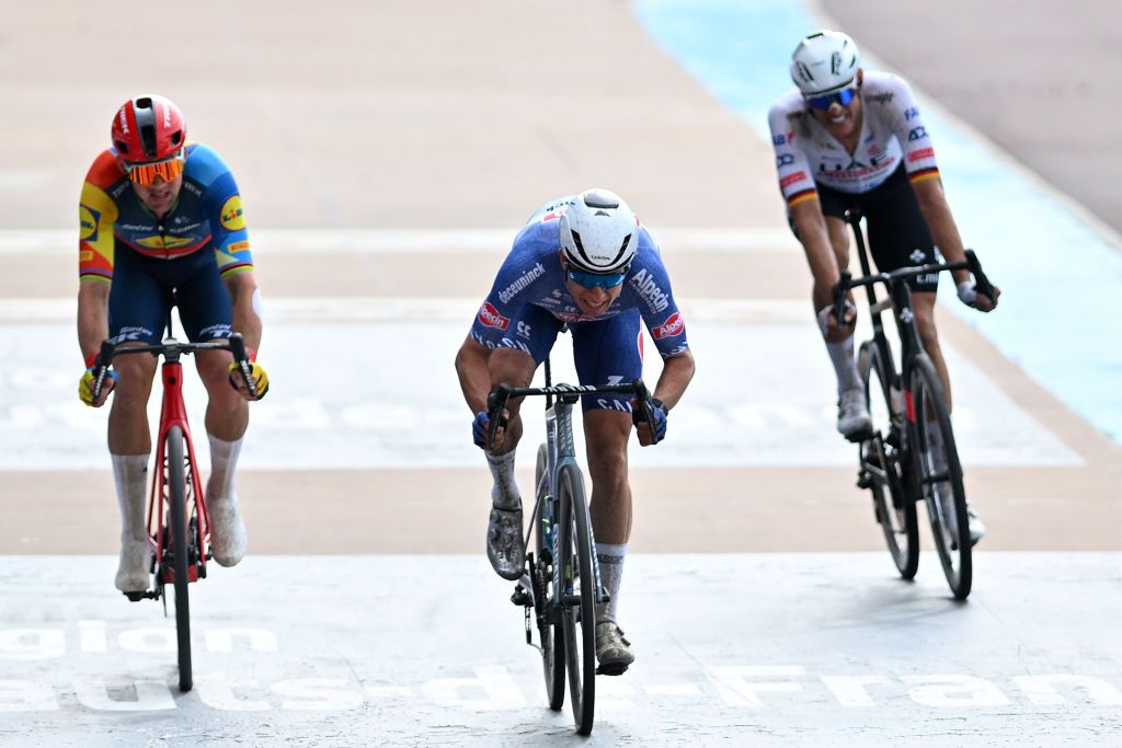 ROUBAIX FRANCE APRIL 07 LR Mads Pedersen of Denmark and Team Lidl Trek Jasper Philipsen of Belgium and Team Alpecin Deceuninck and Nils Politt of Germany and UAE Team Emirates sprint at finish line during the 121st ParisRoubaix 2024 a 2597km one day race from Compiegne to Roubaix UCIWT Roubaix Velodrome Velodrome Andre Petrieux on April 07 2024 in Roubaix France Photo by Luc ClaessenGetty Images