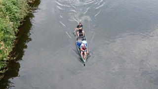 Pat Kinsella and his dad canoeing up the River Barrow