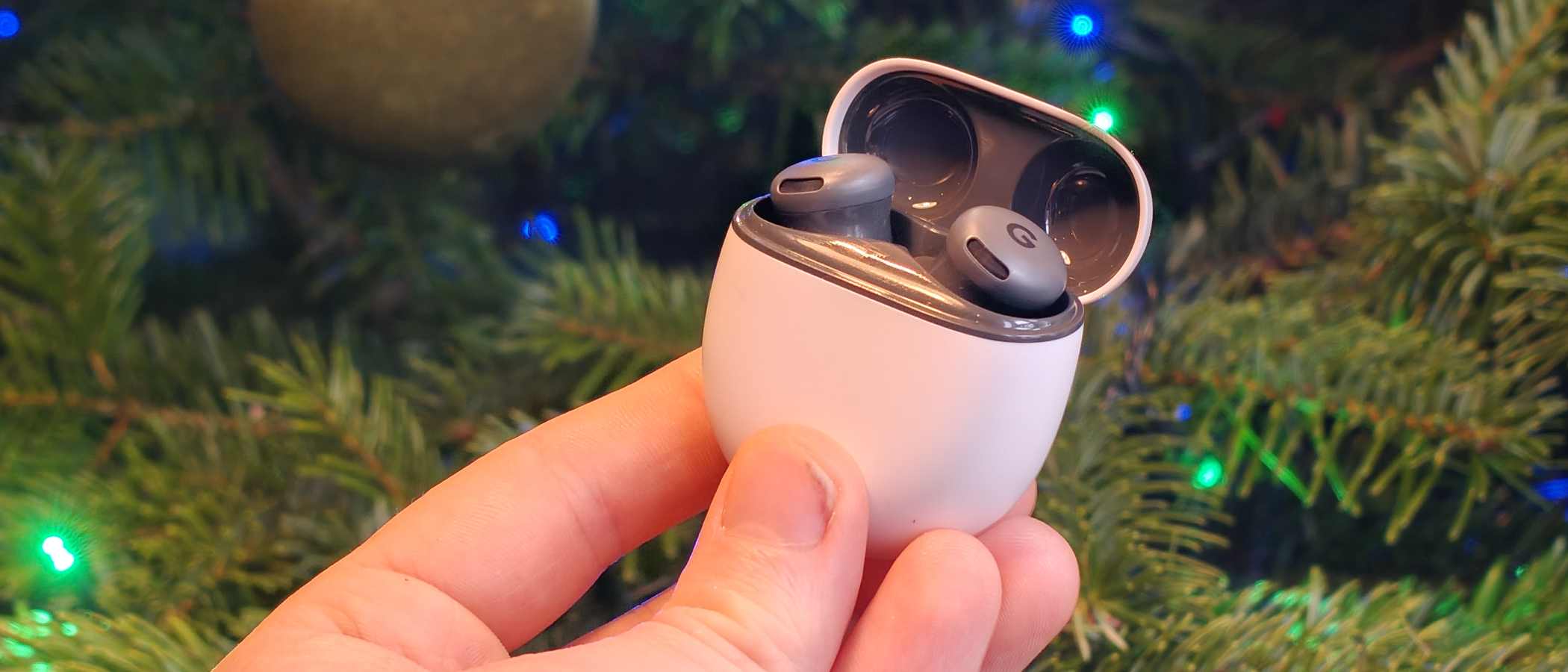 The Google Pixel Buds 2a buds in the case.