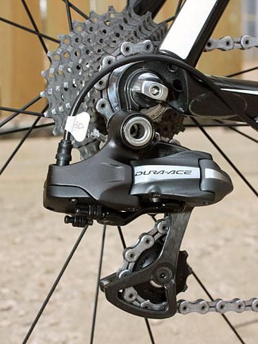 The rear derailleur is fairly standard-looking save for the bulbous appendage that has sprouted out the back to house the stepper motor.