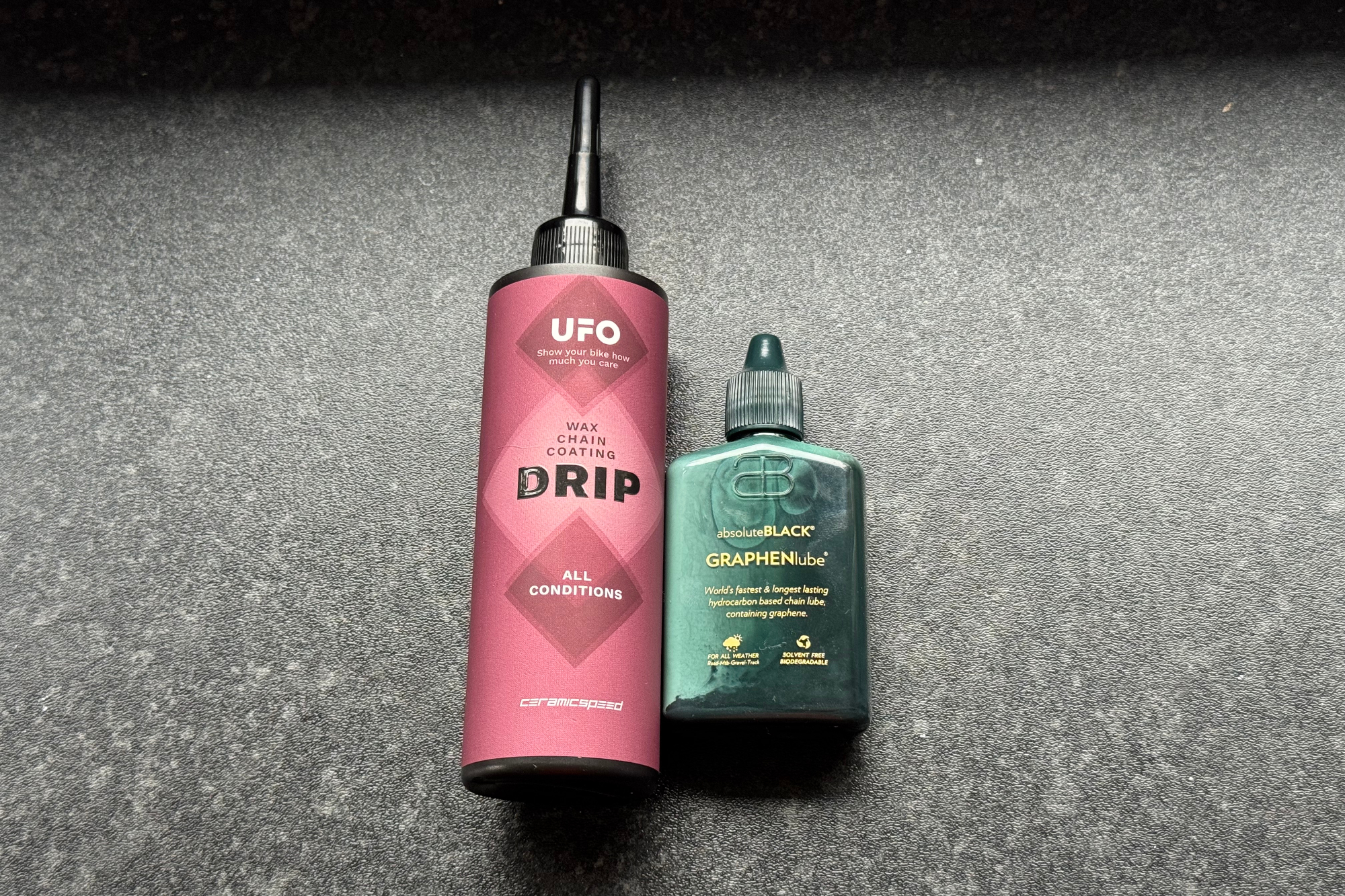 Two bottles of chain wax