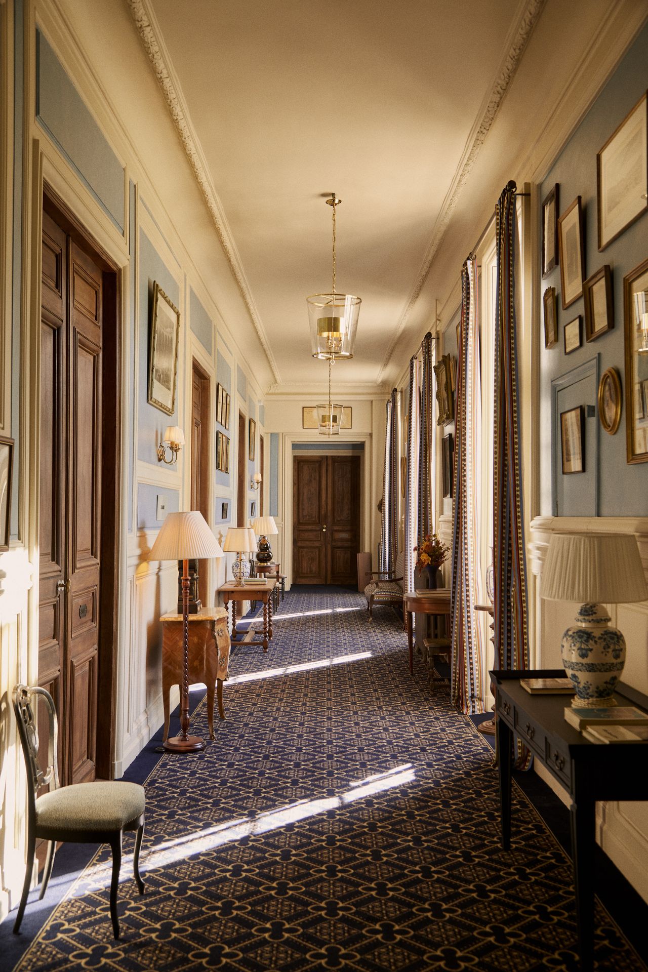 Hallway covered in paintings