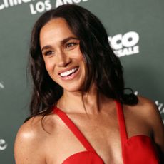 Meghan Markle wears a red dress