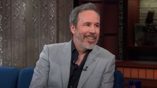 Denis Villeneuve smiling during an interview on The Late Show.