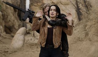 Ana de la Reguera held at knifepoint in The Forever Purge.
