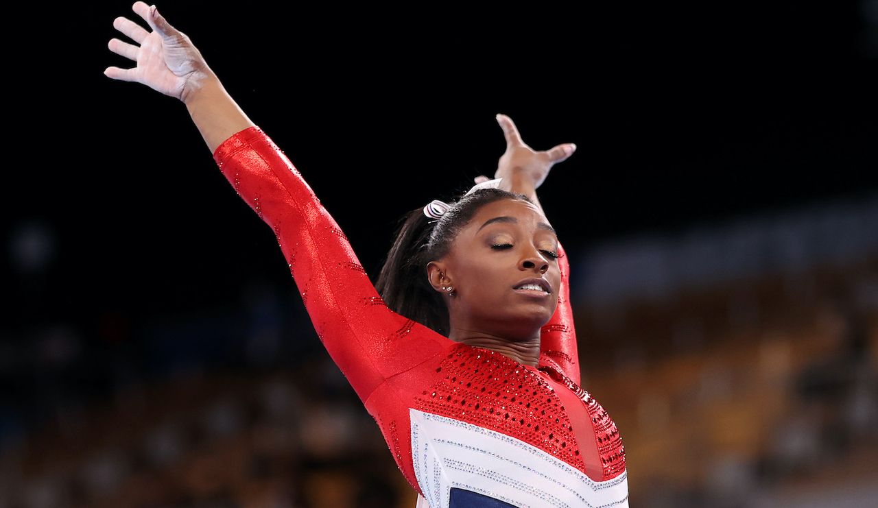 TOKYO, JAPAN - JULY 27: Simone Biles of Team United States competes on vault during the Women&#039;s Team Final on day four of the Tokyo 2020 Olympic Games at Ariake Gymnastics Centre on July 27, 2021 in Tokyo, Japan. (Photo by Laurence Griffiths/Getty Images)