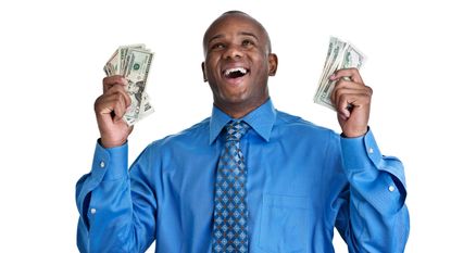 picture of happy man holding money in both hands