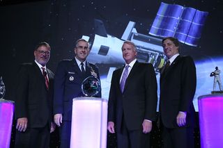 Left to right: Space Foundation Chief Executive Officer Elliot Pulham; Gen. John Hyten, Commander, Air Force Space Command, Peterson Air Force Base, Colorado; Craig Cooning, president of Network and Space Systems for The Boeing Company; and Lon Levin, Chairman, Space Foundation Board of Directors.