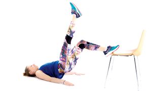 30 day legs challenge: woman demonstrating single leg lift