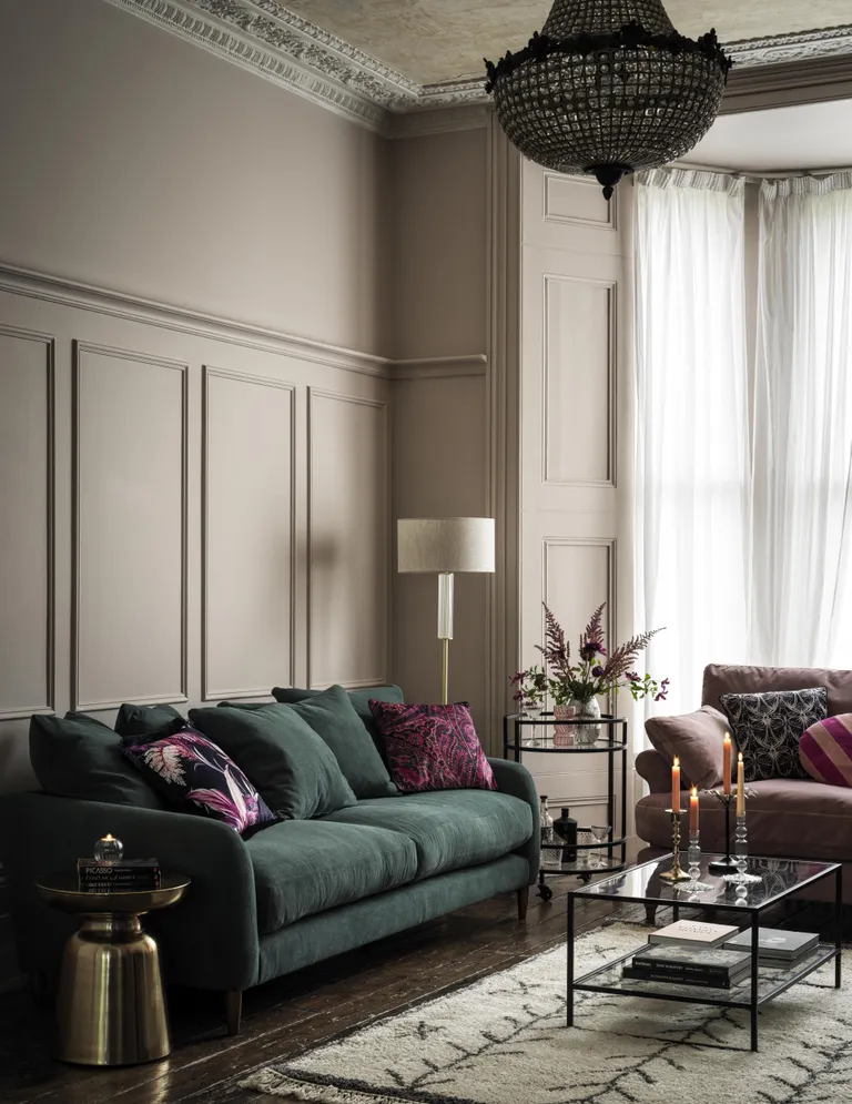 Sofa and armchair with pillows and coffee table from Marks & Spencer