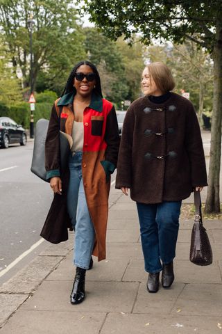 Woman wears M&S textured buckled coat