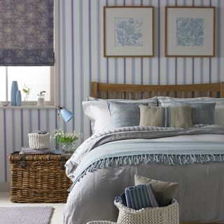 bedroom area with blue bed