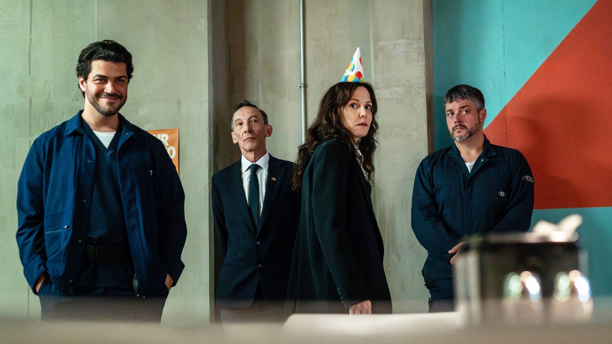 Jason Diaz as Tony, Julian Richings as Stackhouse, and Mary-Louise Parker as Ms. Sigsby in "The Institute"