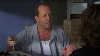 Bruce Willis holding a martini in The Whole Nine Yards
