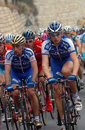 Eventual winner Filippo Pozzato (r) rides with teammate and former winner Paolo Bettini