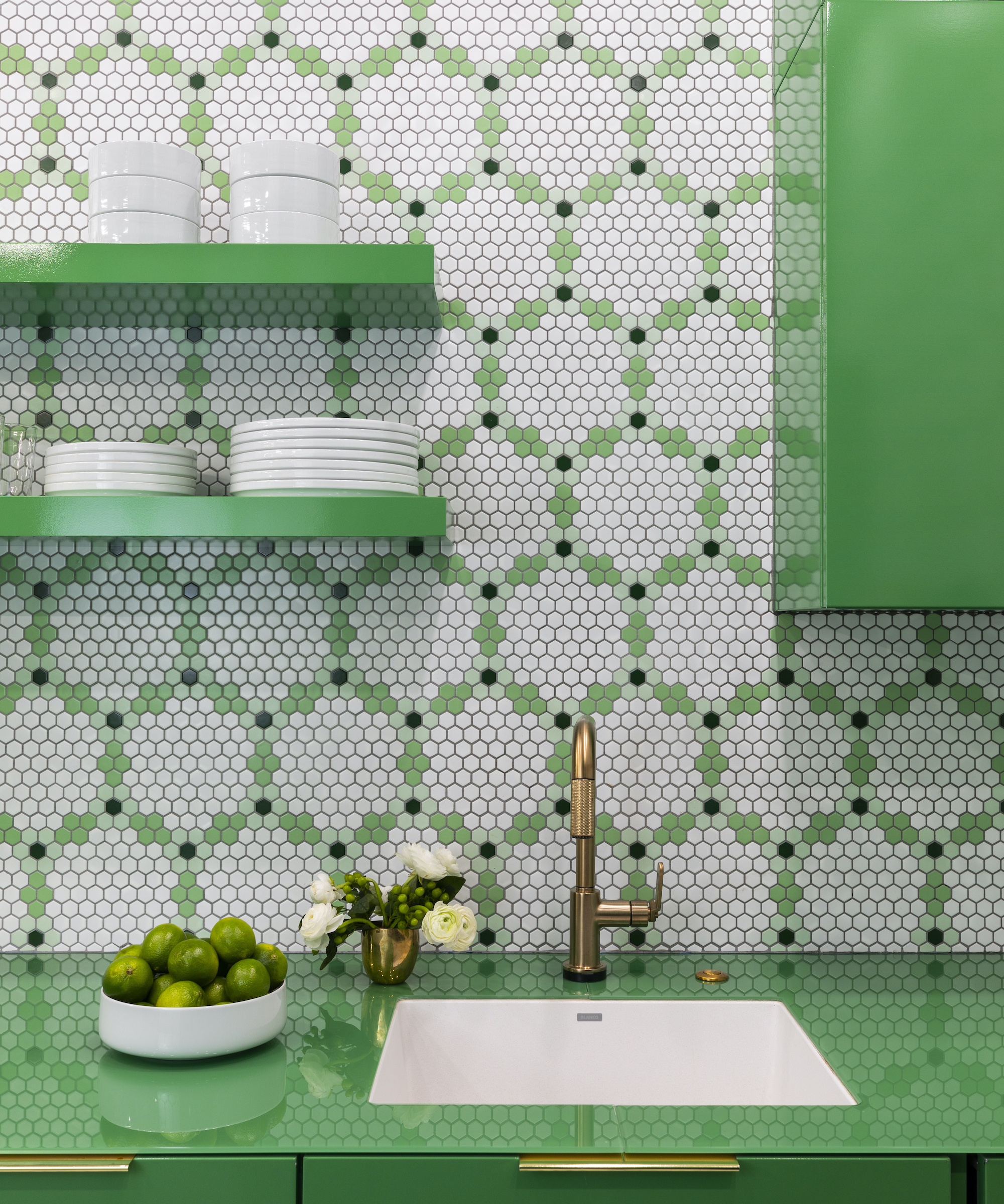 gloss green kitchen with honeycomb mosaics