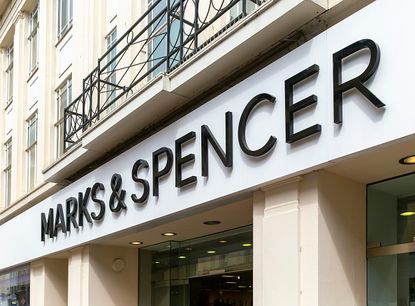 Sign for Marks & Spencer department store in town centre