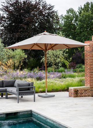 Garden Parasol in Khaki with granite base, £560 from www.gardentrading.co.uk