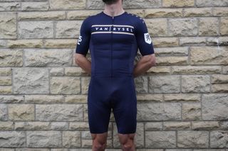 Image shows a rider wearing the Van Rysel Aerosuit Racer.