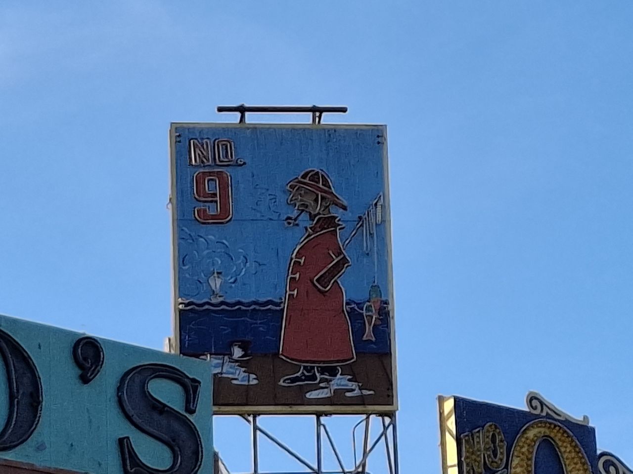 8x zoom on fisherman's Grotto sign by Galaxy A35