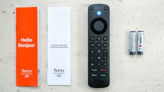 The Alexa Voice Remote Pro with manuals and batteries