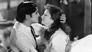 (L-R) Richard Dix as Yancey Cravat and Irene Dunne as Sabra Cravat in "Cimarron"