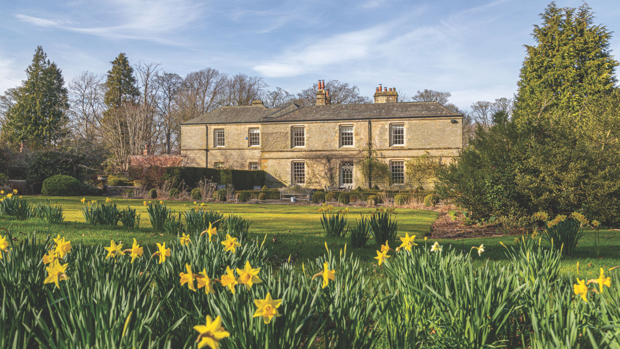 Georgian country house surrounded by gardens