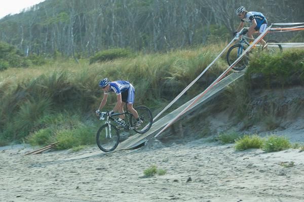 Ben Mather leads James Williamson onto the beach.
