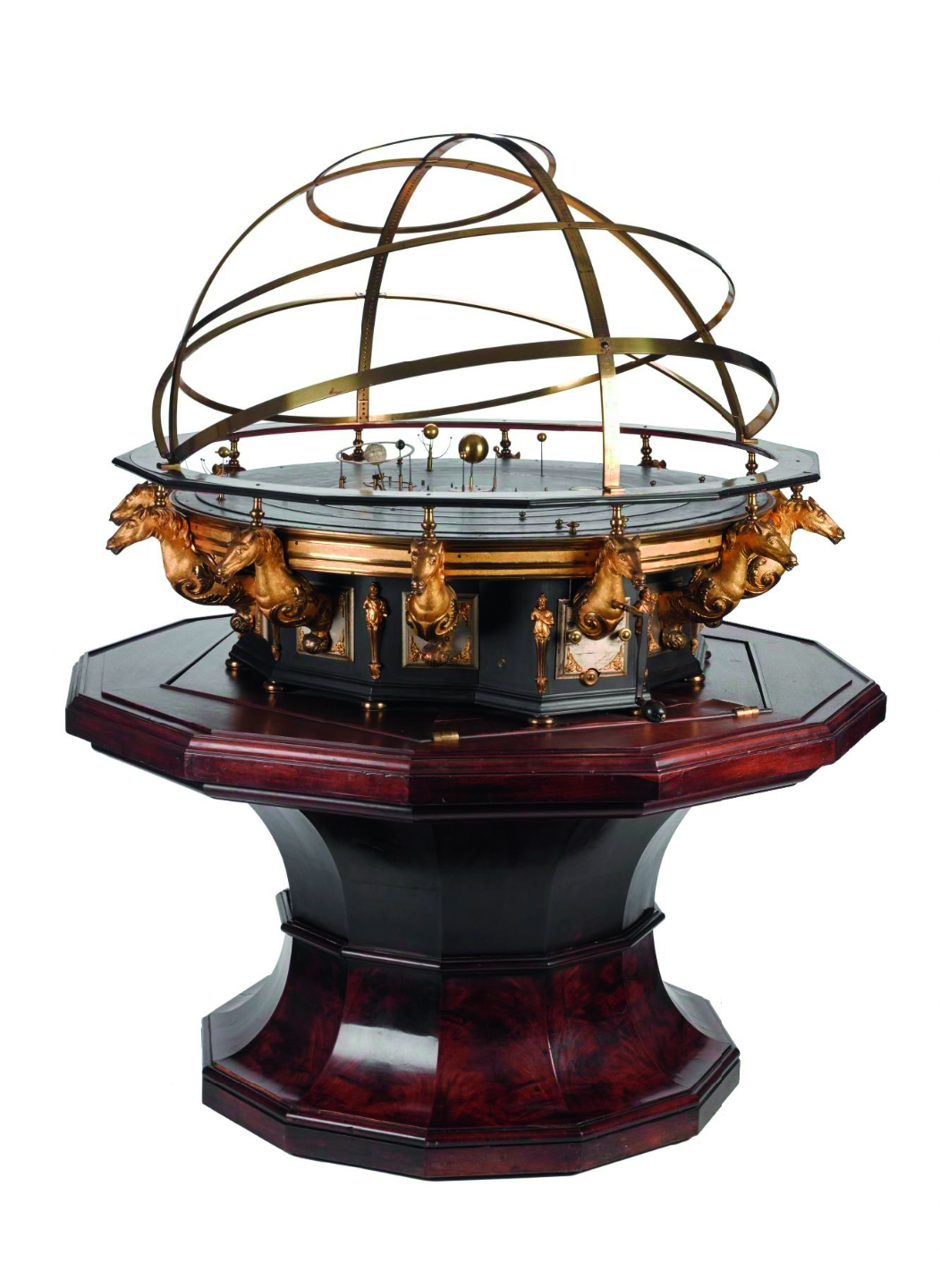 George II's Grand Orrery, a spherical contraption on a wooden table with planets and the sun spinning around