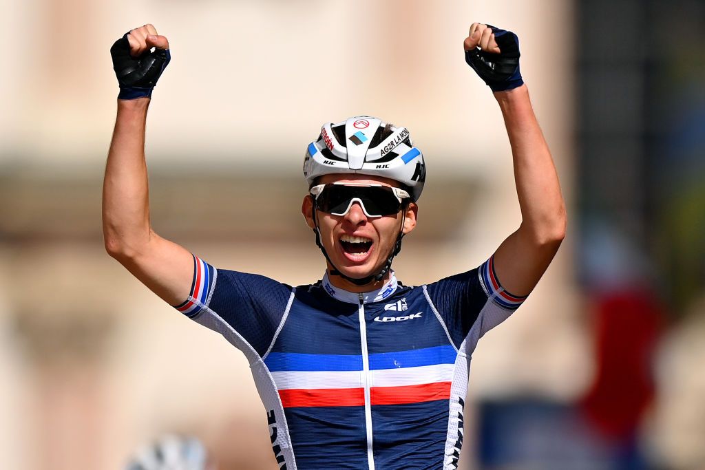 TRENTO ITALY SEPTEMBER 10 Romain Gregoire of France celebrates winning during 27th UEC Road Cycling European Championships 2021 Junior Mens Road Race a 1056 Km race from Trento to TrentoPiazza Duomo UECcycling on September 10 2021 in Trento Italy Photo by Justin SetterfieldGetty Images