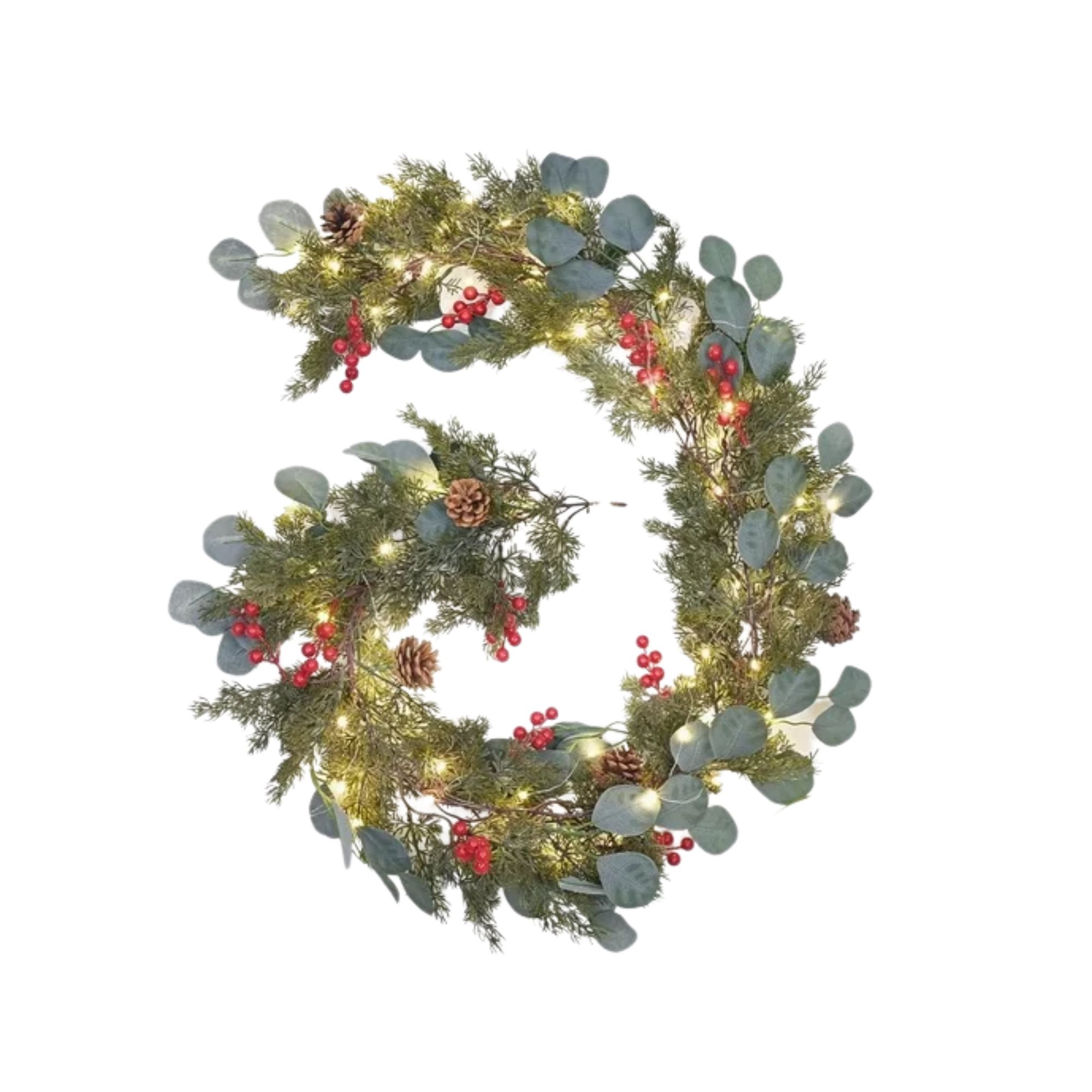 A green Christmas garland with red berries and glowing lights