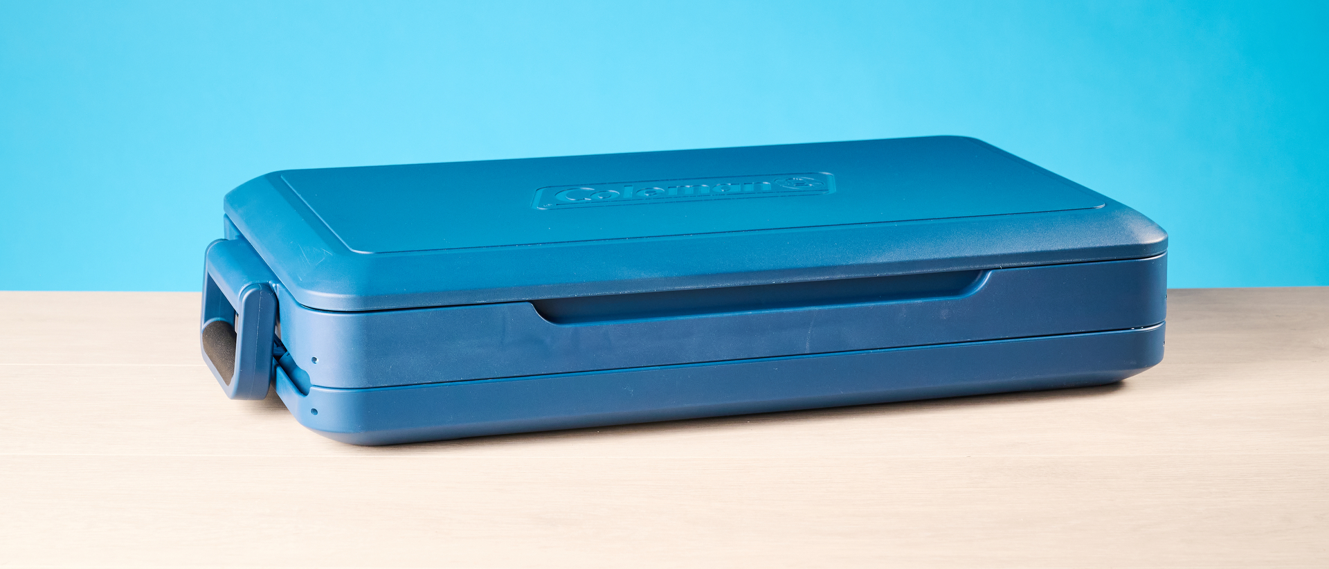 the coleman snap 'n go collapsible cooler photographed with the blue tom's guide background