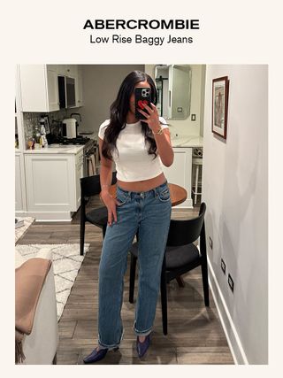 Sierra Mayhew, fashion editor, reviewing jeans.