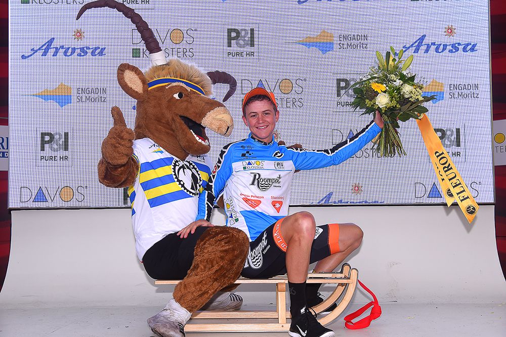 Best Young Rider Antwan Tolhoek on the final podium at Tour de Suisse