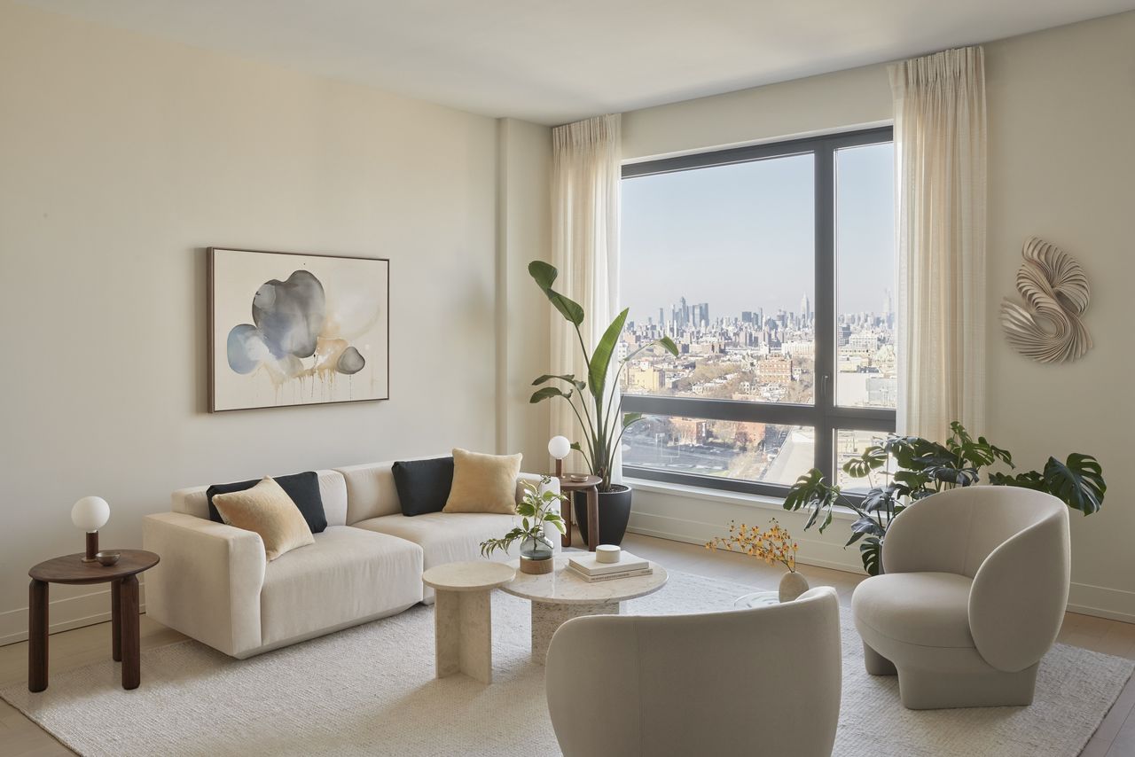 A small living room with neutral palette