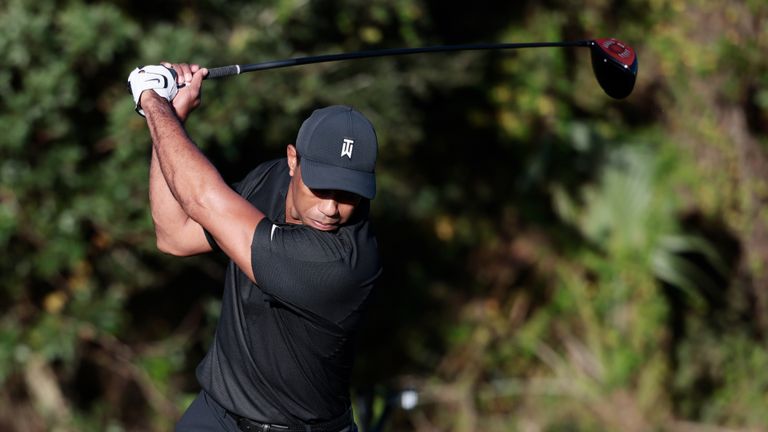 Tiger Spotted Using New Red-Faced TaylorMade Driver 