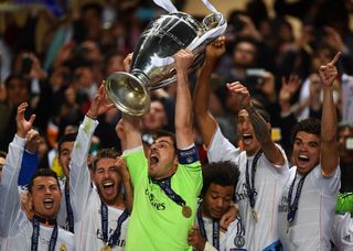 Iker Casillas lifts the Champions League trophy after Real Madrid's win over Atletico Madrid in the 2014 final.