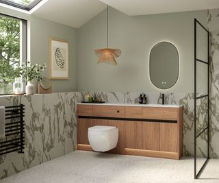 contemporary bathroom with green and white colour palette, wooden furniture and glazed window with skylight above