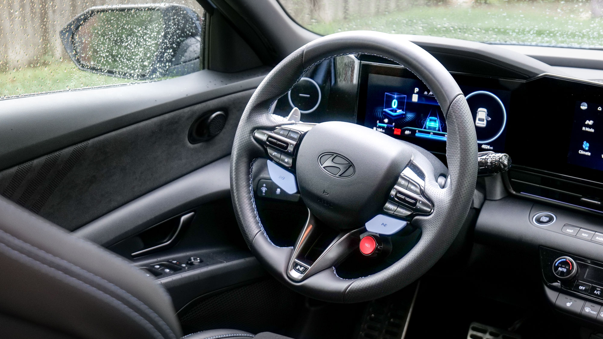 2025 Hyundai Elantra N test drive review pros and cons.