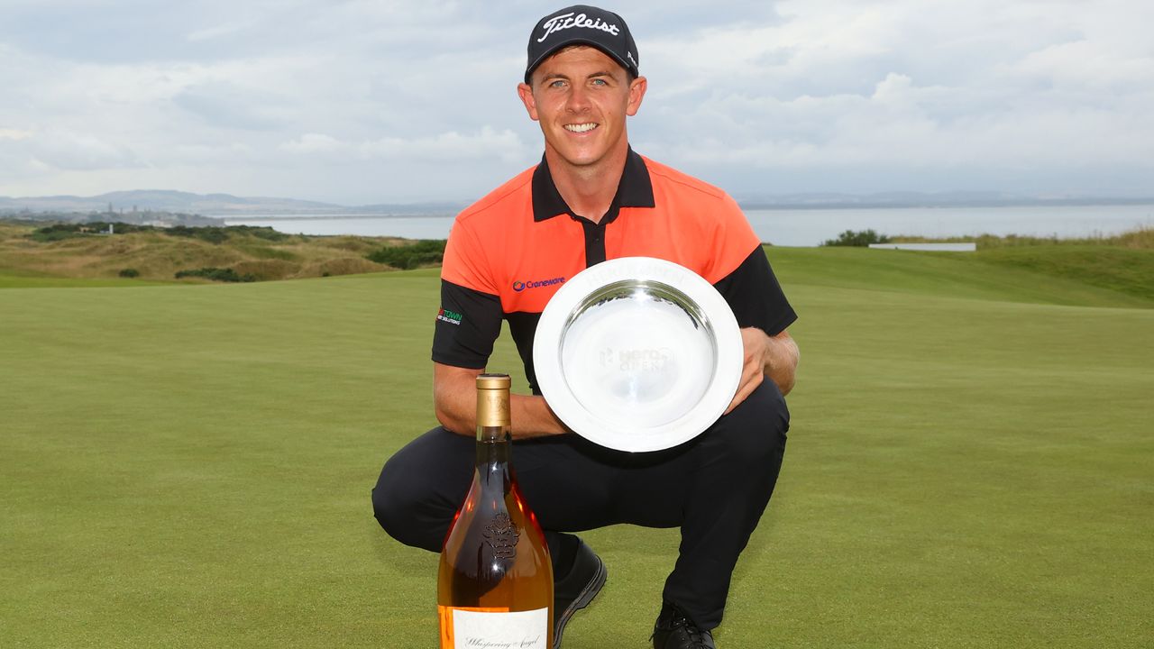 Grant Forrest poses with the trophy after his win in the 2021 Hero Open