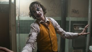 Joaquin Phoenix as clowned-up Arthur Fleck in Joker