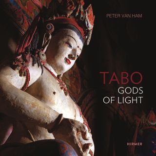 The cover of Tabo: Gods of Light Cover featuring a large stature on a black background